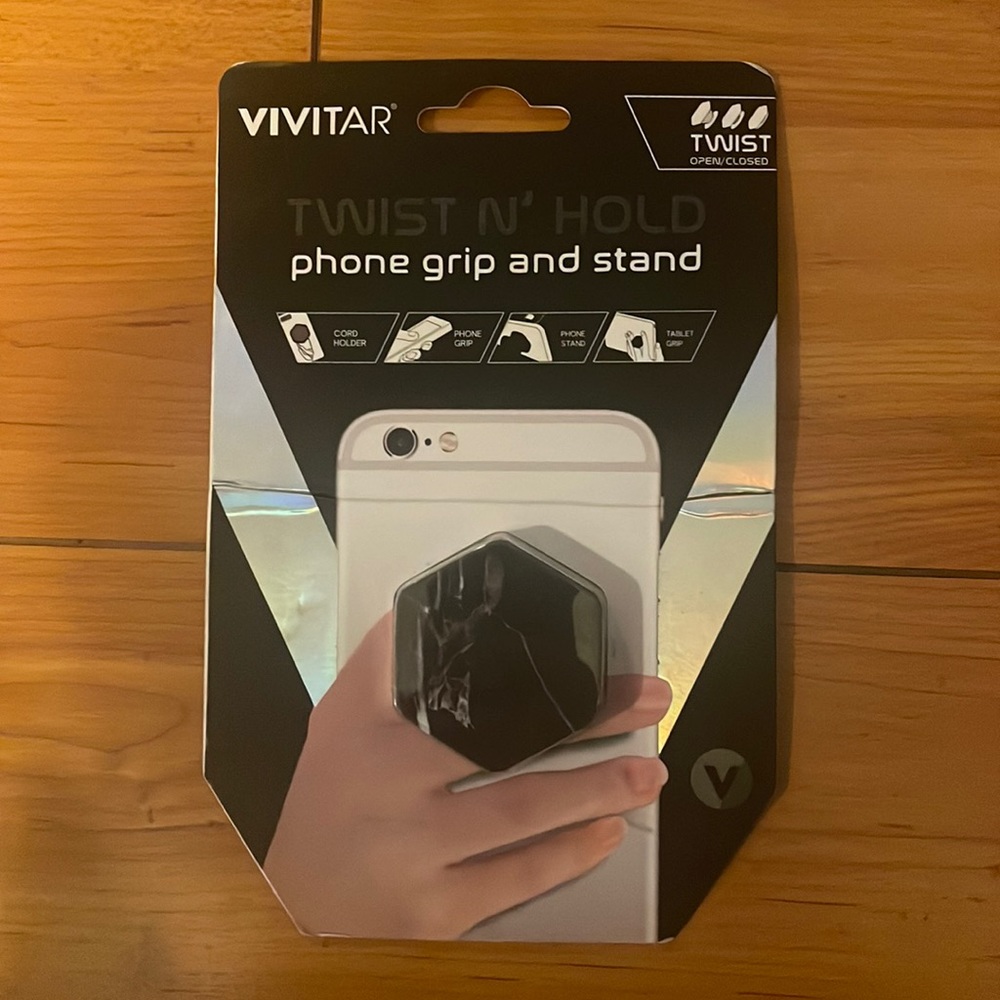 ⭐️Vivitar twist n' hold phone grip & stand for cell phone